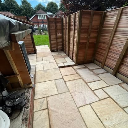 Stone patio and timber fencing